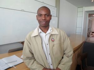 lecturer showing off firefox badge