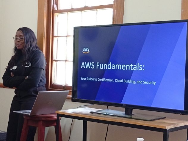 Hildah Machando, prensenting at an AWS Meetup at FlexiWork