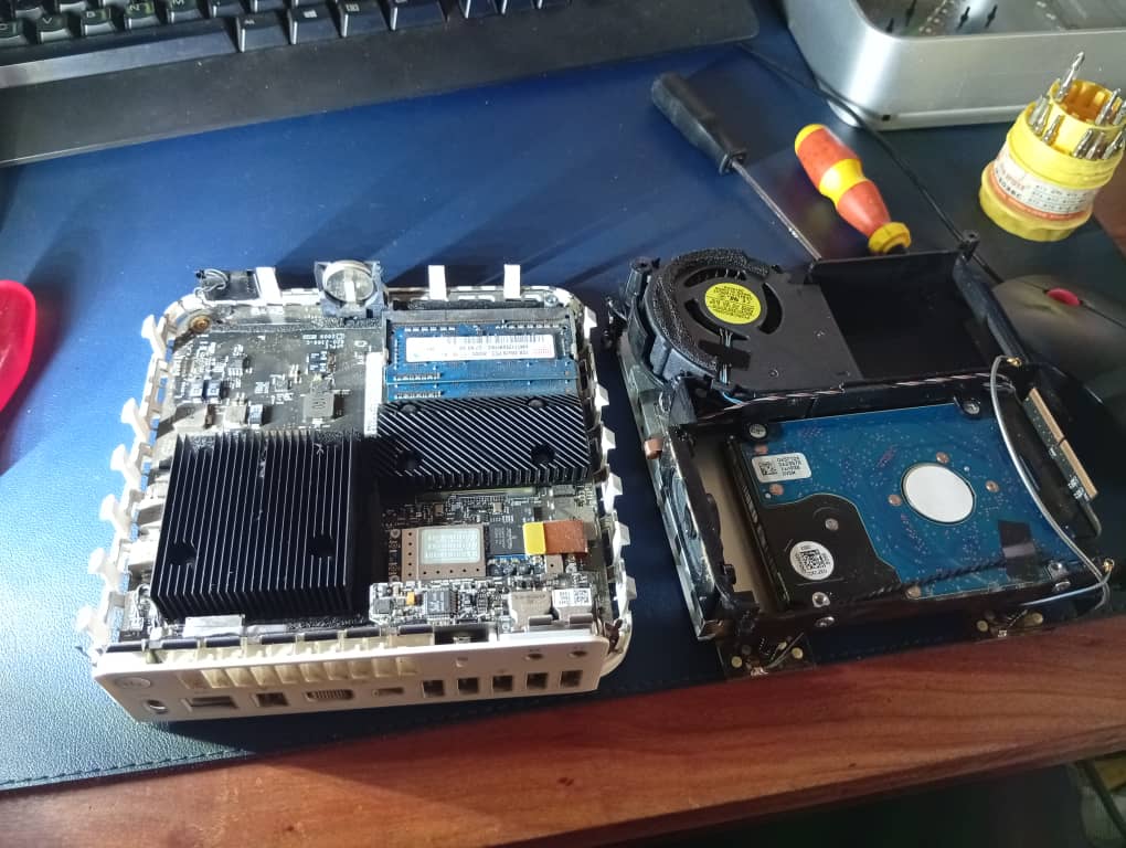Disassembled Mac Mini with HDD still in connector